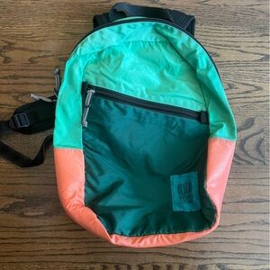 Topo Designs Light Backpack in green and pink